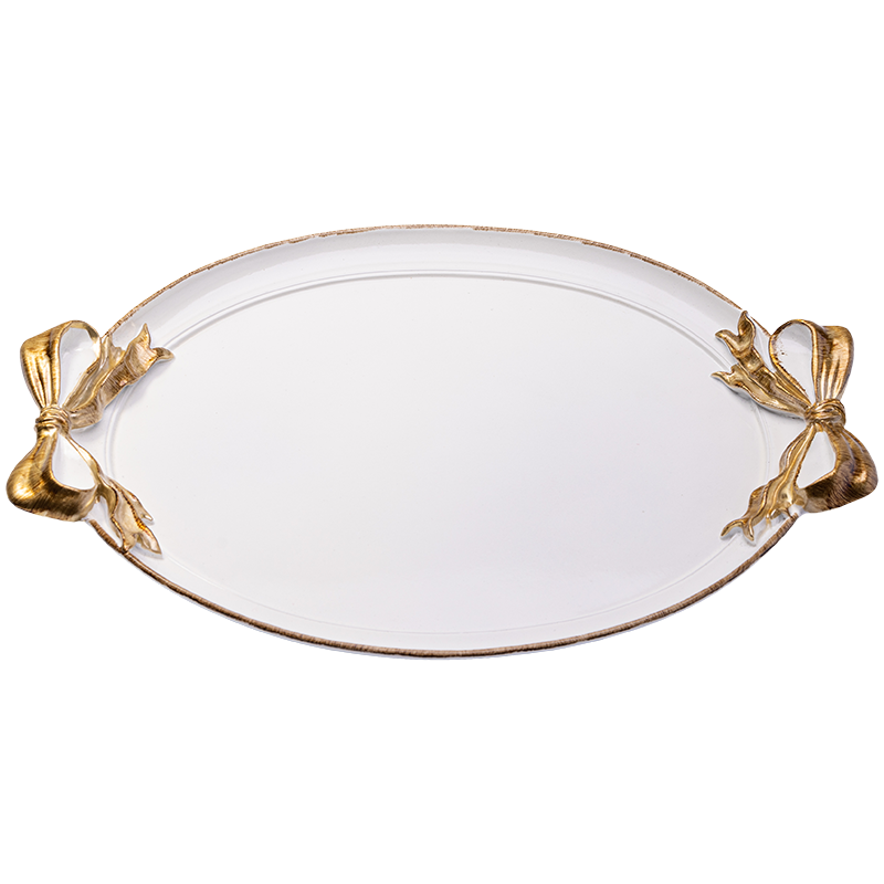 round white tray with gold ribbon handles