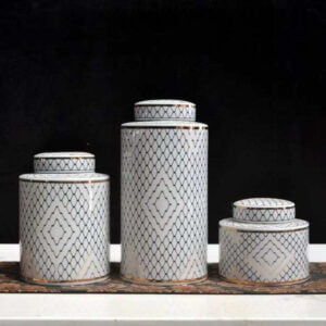 3 jar set diffrent sizes with matching lids, elegent mix of white and black colors to elevate your home decor, and gold egges