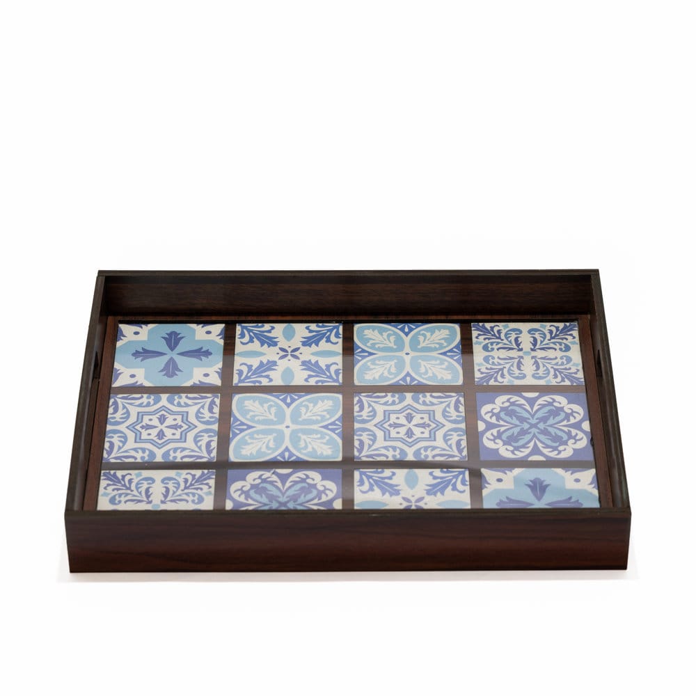 Rectangular dark wood serving tray with a blue and white Mediterranean tile pattern base.