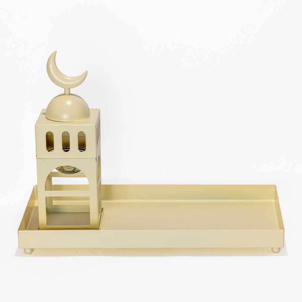 Cream metal modular incense burner set that transforms from a stacked mosque silhouette into a separate tray and burner station.